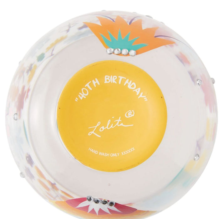 With bedazzled crystals and an array of colorful flowers, this glass is showcasing how far you've grown and experienced.