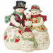 Jim Shore Decorative snowman family figurine with geometric patterns and festive attire on a white background