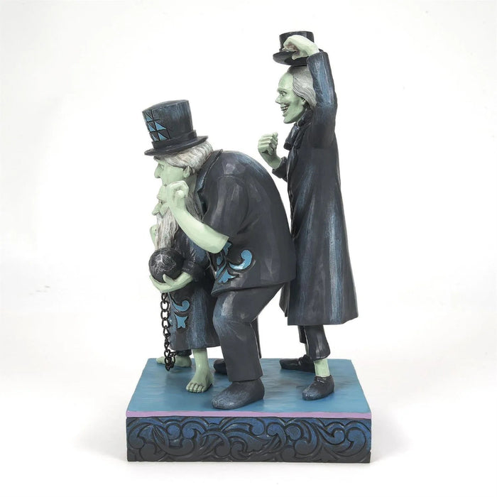  Right side view of Disney Traditions Hitchhiking Ghosts collectible figurine  by Jim Shore, featuring Phineas, Ezra, and Gus on a white background 