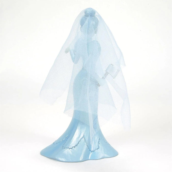 Back side of Hand-painted Haunted Mansion ghost bride figurine by Jim Shore, wearing an intricate patterned wedding gown and clutching an ax on a white background 