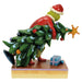 Animated  Grinch character  Jim Shore figurine with a Christmas tree and gift on a white background