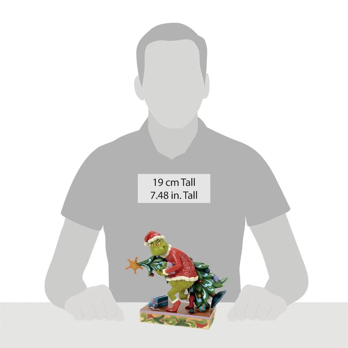 Grinch figurine with a Christmas tree, size indicated on a gray silhouette, white background