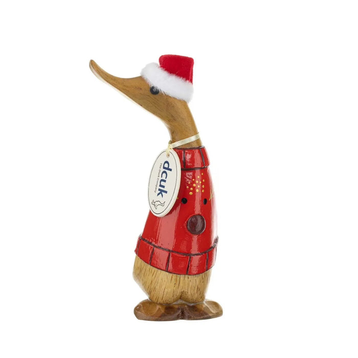 Decorative duck figurine wearing a Santa hat and red outfit on a white background