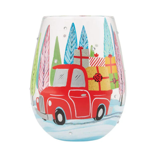 Stemless wine glass with a red truck and Christmas presents design on a white background