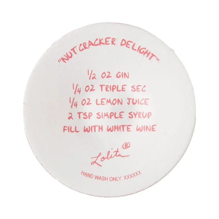 Round Wine glass base with red text displaying a cocktail recipe and brand name on a white background
