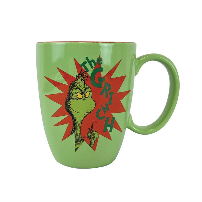 Green mug with Grinch design on a white background