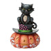 Black cat perched on a classic top hat in a whimsical Halloween figurine designed for spooky seasonal décor.