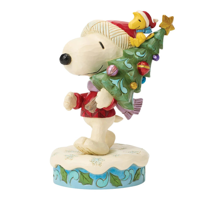 This Jim Shore Snoopy and Woodstock with Tree Figurine brings the beloved Peanuts characters to life with Jim Shore’s signature folk-art styling.