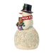 This Jim Shore Snowman with Gingerbread Cookies Figurine brings a sweet and cheerful touch to your Christmas décor.