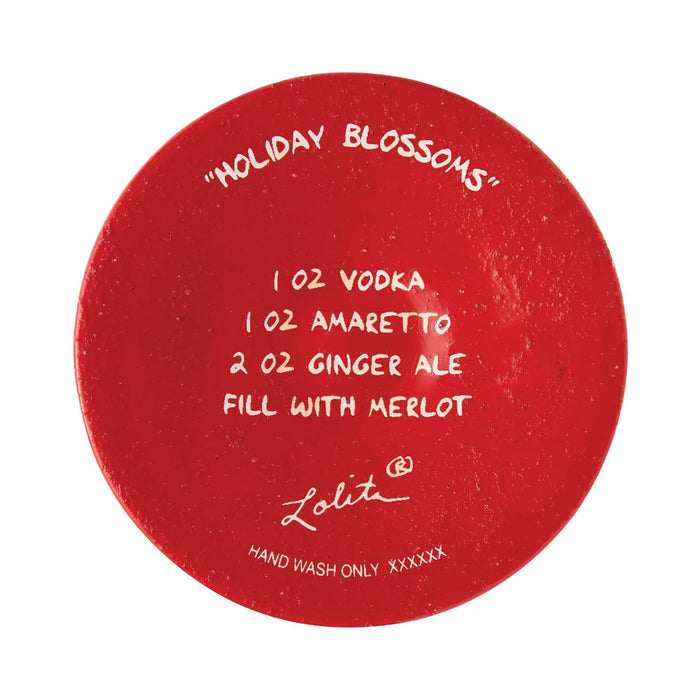 This Lolita Holiday Blossoms Wine Glass adds a cheerful seasonal touch to your table, while the classic wine glass shape makes it perfect for serving your favorite drinks.