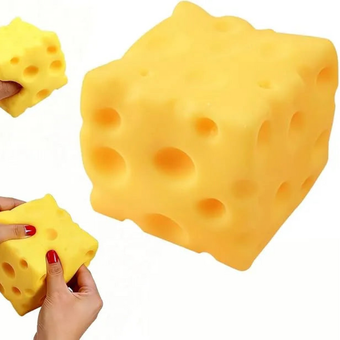 Yellow cheese-shaped foam block with hands holding smaller pieces on a white background