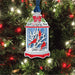 Decorative Christmas ornament with red cardinals on a tree