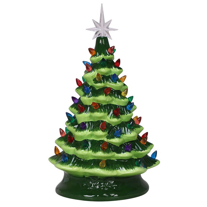 Decorative Christmas tree figurine with colorful lights and a star on a white background