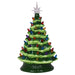 Decorative Christmas tree figurine with colorful lights and a star on a white background