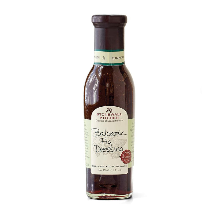 "A bottle of Stonewall Kitchen Balsamic Fig Dressing in a white background."
