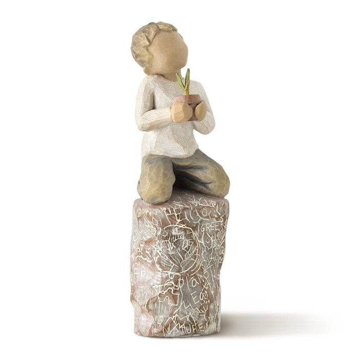 "Willow Tree Something Special Figurine – boy kneeling with potted plant on carved base, hand-painted resin sculpture by Susan Lordi symbolizing kindness and gratitude"