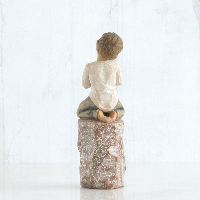 "Willow Tree Something Special Figurine – boy kneeling with potted plant on carved base, hand-painted resin sculpture by Susan Lordi symbolizing kindness and gratitude"
