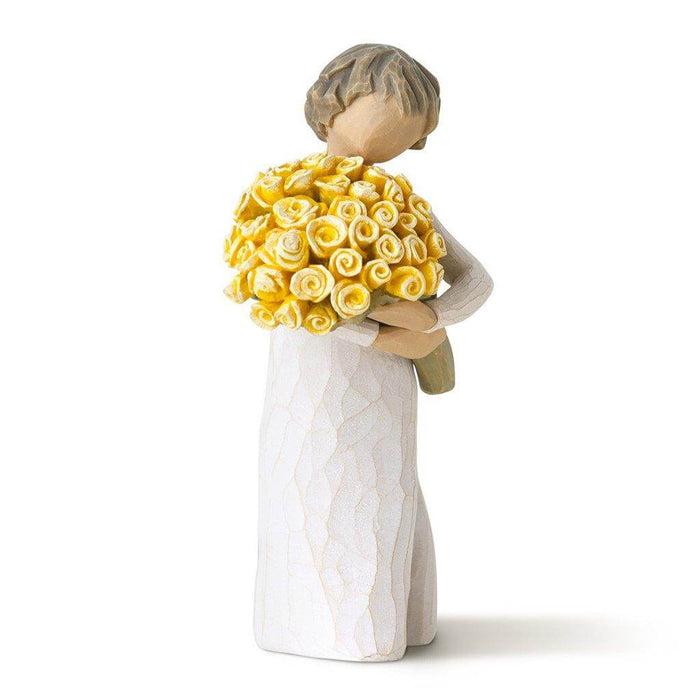 "Willow Tree Good Cheer Figurine – woman holding bouquet of yellow roses, hand-carved resin sculpture by Susan Lordi symbolizing happiness and encouragement"