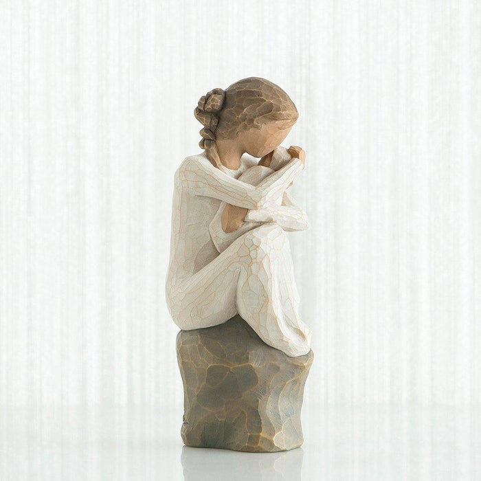 "Willow Tree Guardian figurine by Susan Lordi showing a mother protectively holding her child, hand-carved resin sculpture symbolizing nurturing love and protection"