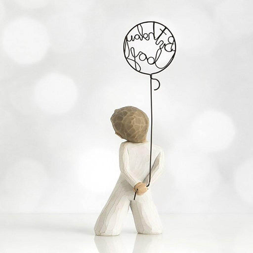 "Willow Tree Birthday Boy figurine of young boy kneeling with wire balloon reading \"Birthday Boy\", perfect birthday gift keepsake."