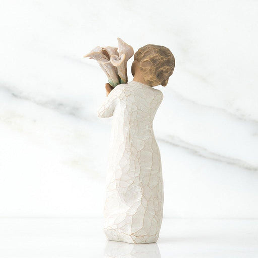"Willow Tree Beautiful Wishes Figurine – Hand-painted resin sculpture of woman holding white calla lilies, symbolizing hope, love, and healing"