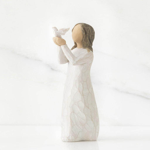 "Willow Tree Soar Figurine – Hand-painted resin sculpture of woman releasing bird, symbolizing encouragement, growth, and new beginnings"