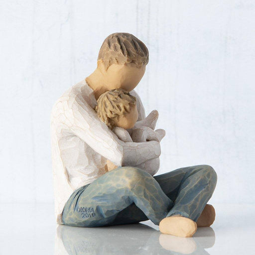 "Willow Tree Little One Figurine – Hand-painted resin sculpture of father cradling baby, symbolizing love, protection, and parent-child bond"