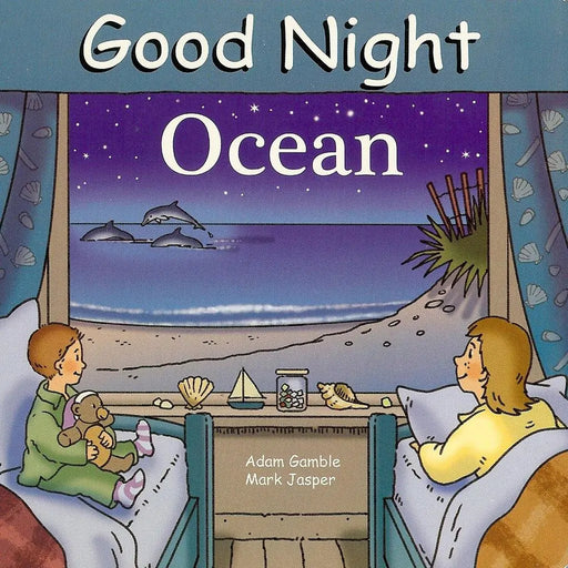 Illustrated book cover of 'Good Night Ocean' with two children looking out a window at a beach scene.