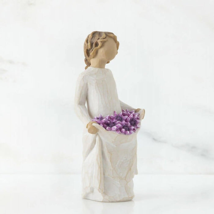 "Willow Tree Simple Joys Figurine – Woman holding purple flowers in skirt, hand-painted resin sculpture symbolizing gratitude and everyday joy"