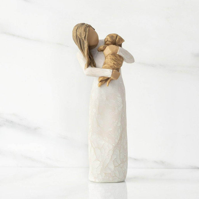 "Willow Tree Adorable You Figurine – Woman holding golden-colored dog, hand-painted resin sculpture celebrating pet love and friendship"