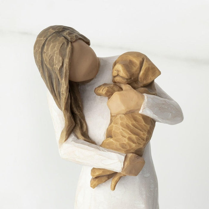 "Willow Tree Adorable You Figurine – Woman holding golden-colored dog, hand-painted resin sculpture celebrating pet love and friendship"