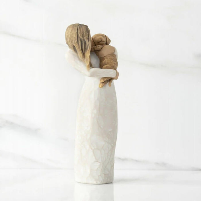 "Willow Tree Adorable You Figurine – Woman holding golden-colored dog, hand-painted resin sculpture celebrating pet love and friendship"