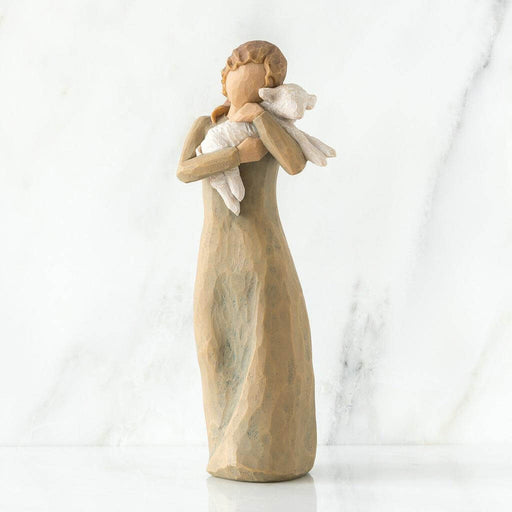 "Willow Tree Peace on Earth figurine of a woman holding a lamb, symbolizing peace and love"