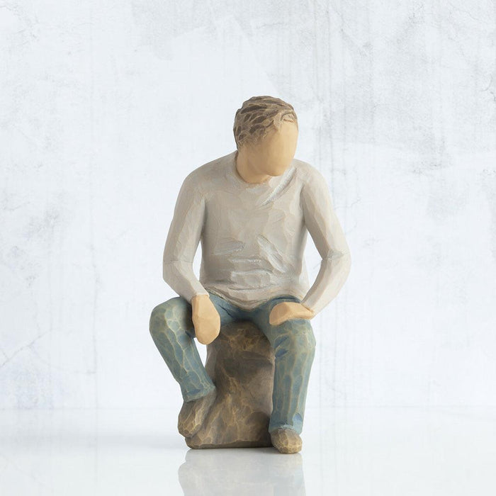 "Willow Tree My Guy figurine of a seated man in a relaxed pose, symbolizing quiet strength and companionship"
