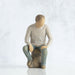 "Willow Tree My Guy figurine of a seated man in a relaxed pose, symbolizing quiet strength and companionship"