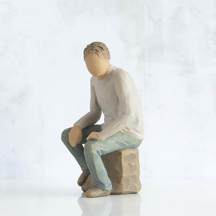 "Willow Tree My Guy figurine of a seated man in a relaxed pose, symbolizing quiet strength and companionship"