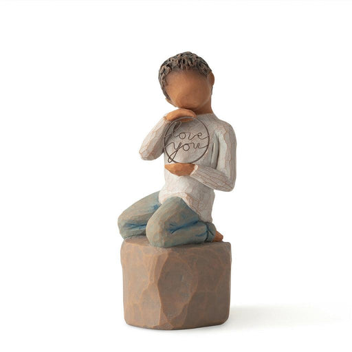 "Willow Tree Love You Too figurine – boy with darker skin kneeling on a pedestal, holding a wire circle that says 'love you' in script."