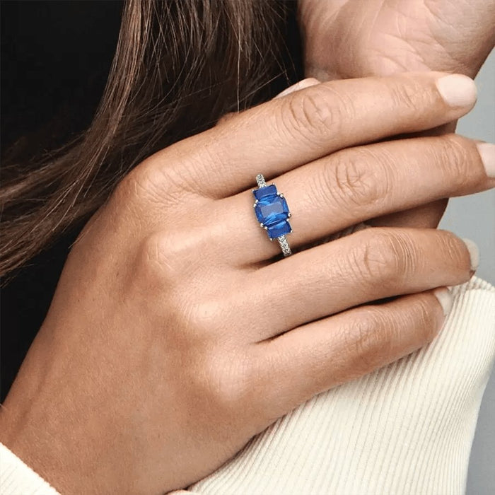 "PANDORA : Blue Rectangular Three Stone Sparkling Ring -"