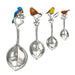"Set of four decorative spoons with bird embellishments on a white background"