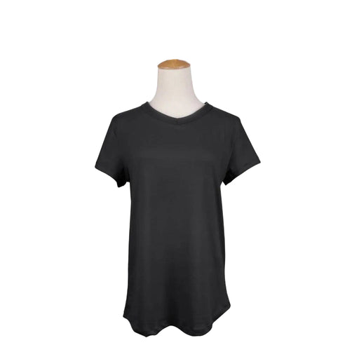 Black t-shirt on a mannequin against a white background