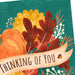 Boxed Hallmark Thanksgiving cards with harvest artwork, pumpkins, golden acorns, deep red leaves, and matching envelopes.