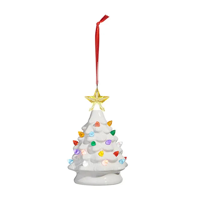 White ceramic Christmas tree ornament with colorful lights and a gold star on a white background