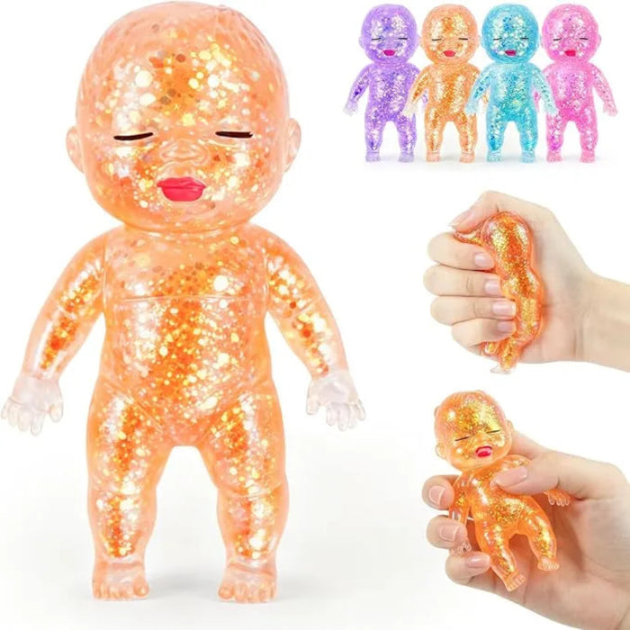 Orange glittery baby toy with additional toys and a hand holding one, on a white background
