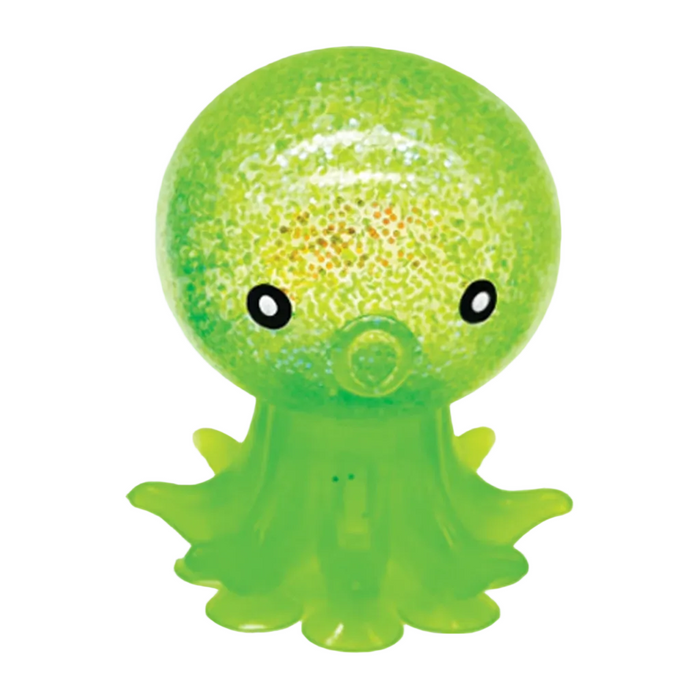 Green glittery octopus toy on a white background