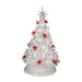 “14.25-inch iridescent white ceramic Christmas tree, pre-lit from within, decorated with red cardinal bird accents and topped with a star, standing on a flat base.”