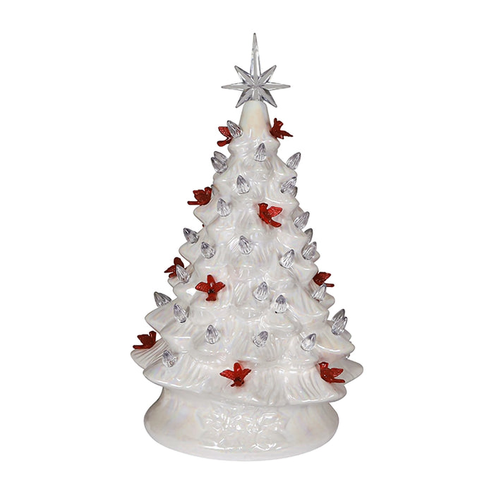 “14.25-inch iridescent white ceramic Christmas tree, pre-lit from within, decorated with red cardinal bird accents and topped with a star, standing on a flat base. Lights off 