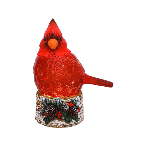 Decorative red cardinal bird figure on a white background