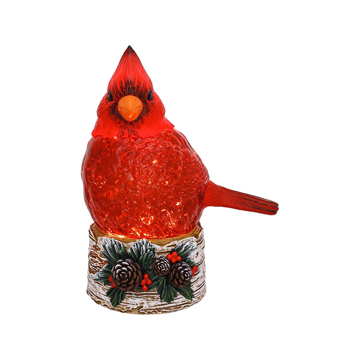 Decorative red cardinal bird figure on a white background