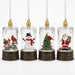 Opportunities mini LED candle glitter lantern ornaments with cardinal, snowman, Christmas tree, and Santa designs, sold separately.