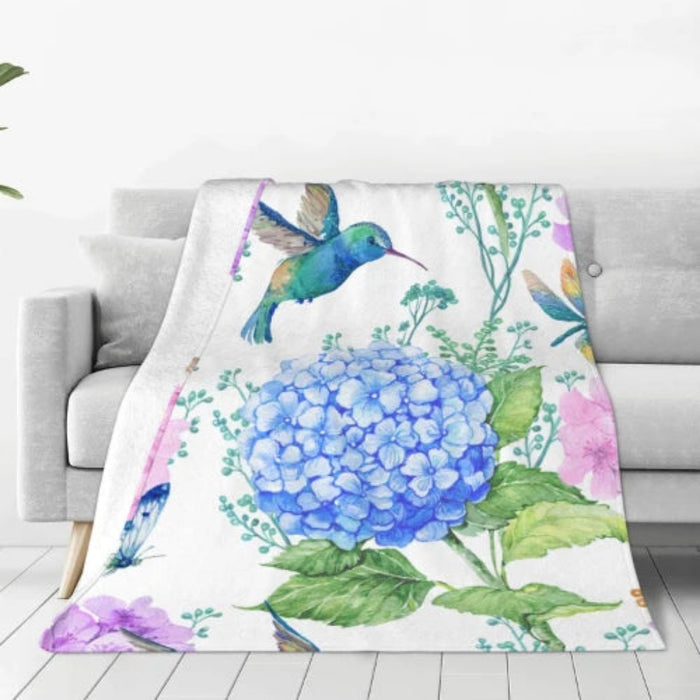 The Opportunities Hummingbird Hydrangea Single Layer Blanket brings beauty and warmth to every moment. 
